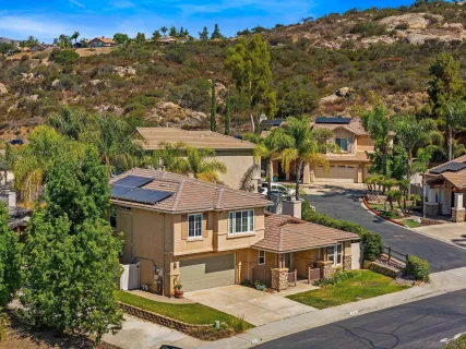 an aerial view of residential house with parking space