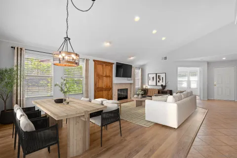 a view of a dining room with furniture window and outside view