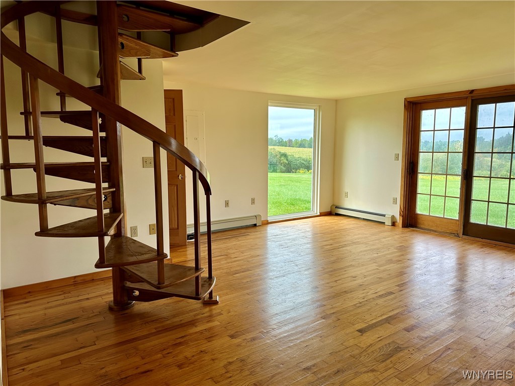 1745 Highway 78 Java, NY 14082 - Photo 37 of 49 Cottage -living room and spiral stairs