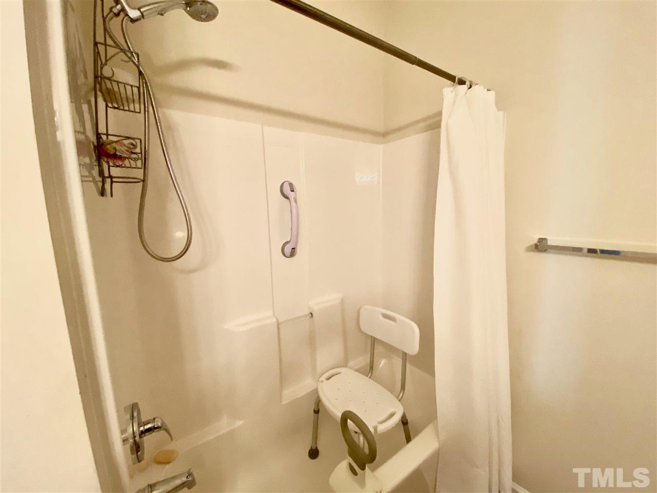 2746 Andover Glen Road Raleigh, NC 27604 - Photo 18 of 30 a bathroom with a granite countertop shower and a sink