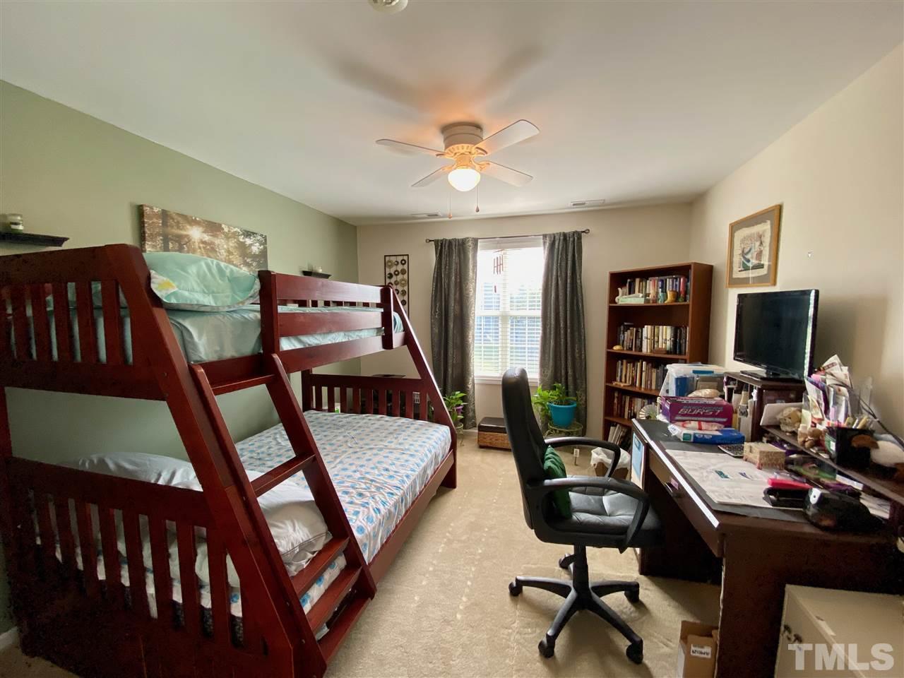 2746 Andover Glen Road Raleigh, NC 27604 - Photo 21 of 30 a view of a workspace with furniture and a window