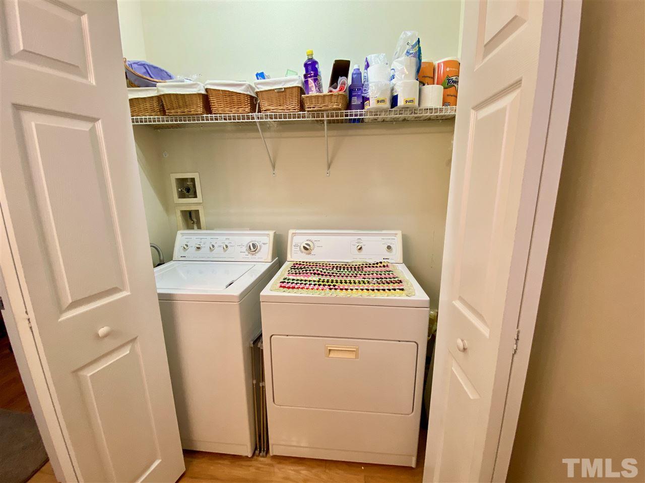 2746 Andover Glen Road Raleigh, NC 27604 - Photo 23 of 30 a utility room with dryer and washer