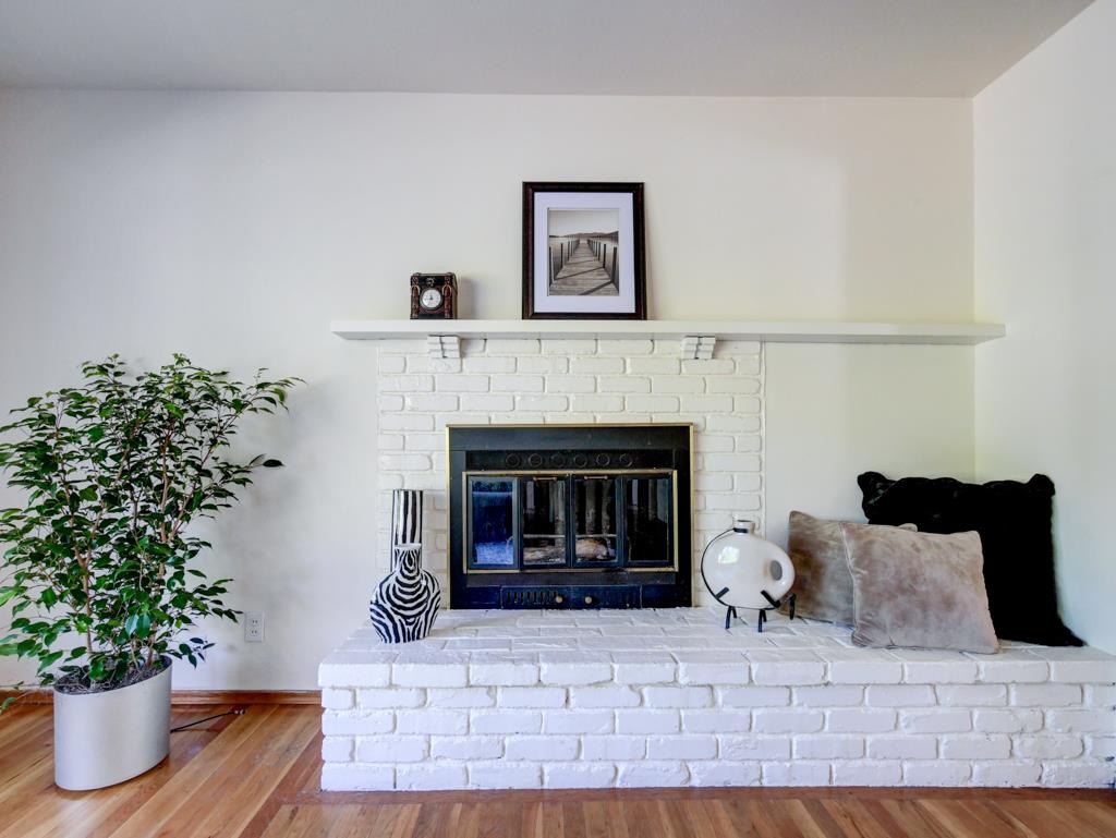 16 Oak Road Santa Cruz, CA 95060 - Photo 16 of 27 a living room with furniture and a fireplace