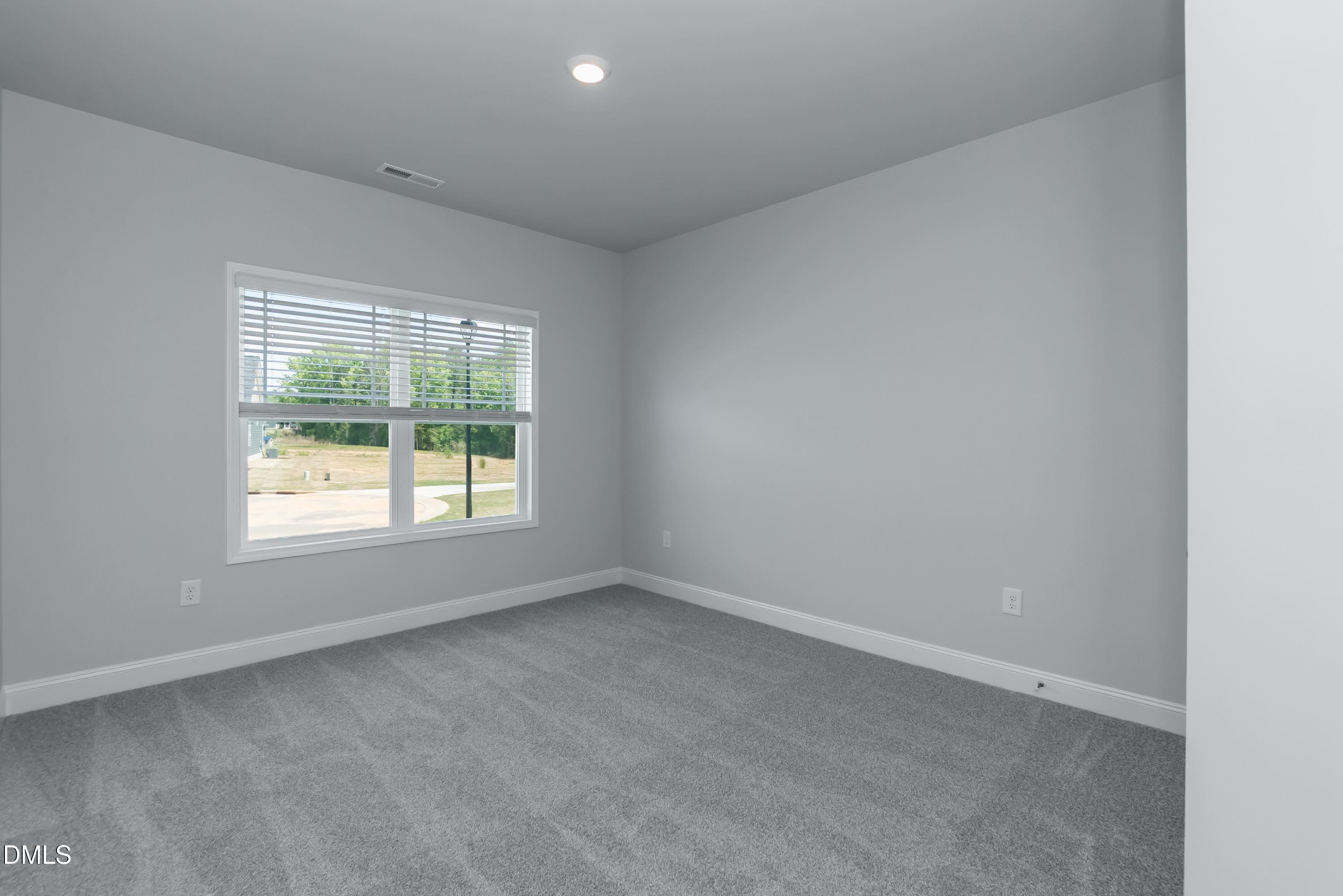 1 Galway Road Lillington, NC 27546 - Photo 15 of 30 an empty room with a window