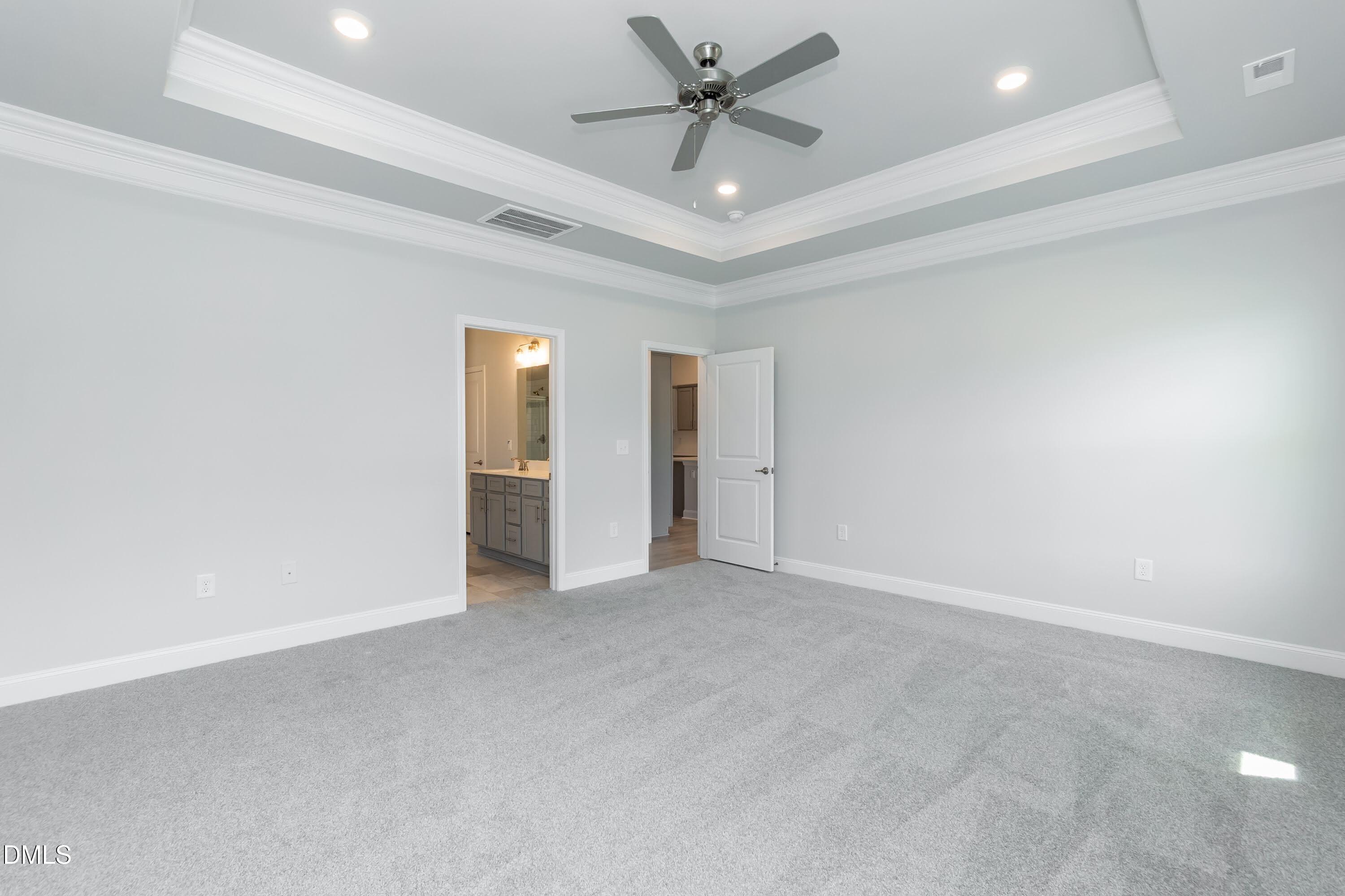 1 Galway Road Lillington, NC 27546 - Photo 17 of 30 an empty room with a ceiling fan and a window