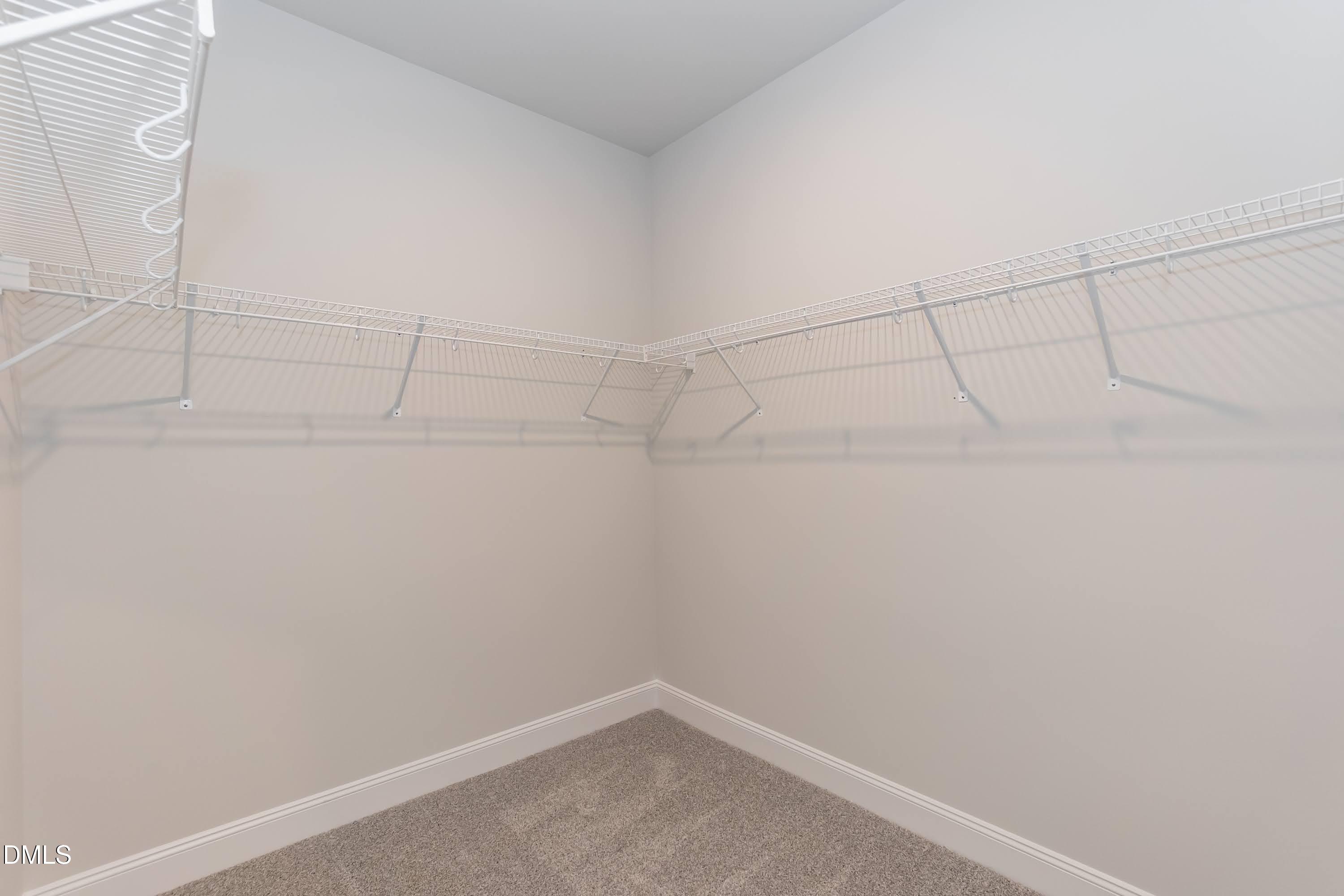 1 Galway Road Lillington, NC 27546 - Photo 19 of 30 a view of a room with racks on the wall