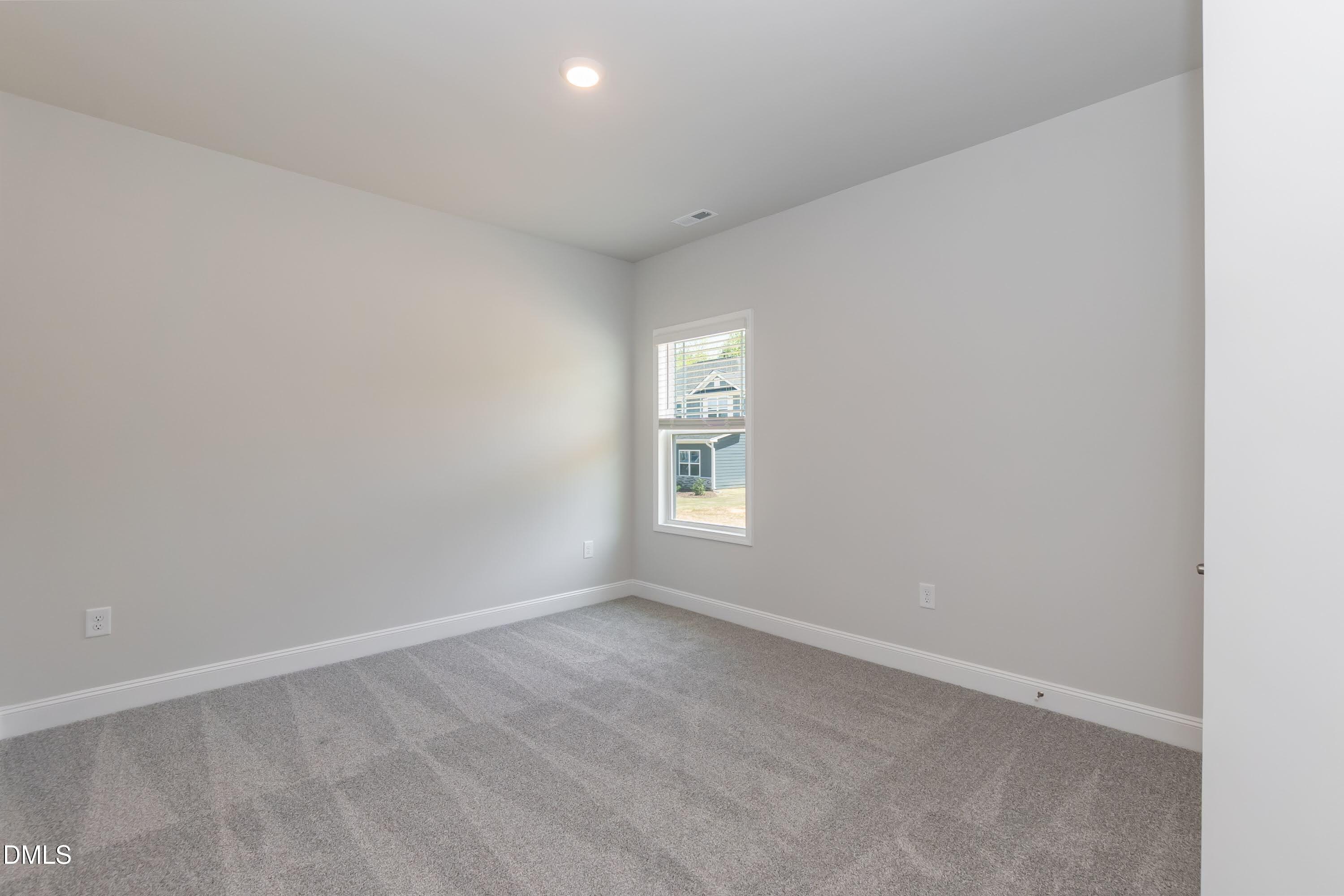 1 Galway Road Lillington, NC 27546 - Photo 22 of 30 an empty room with a window