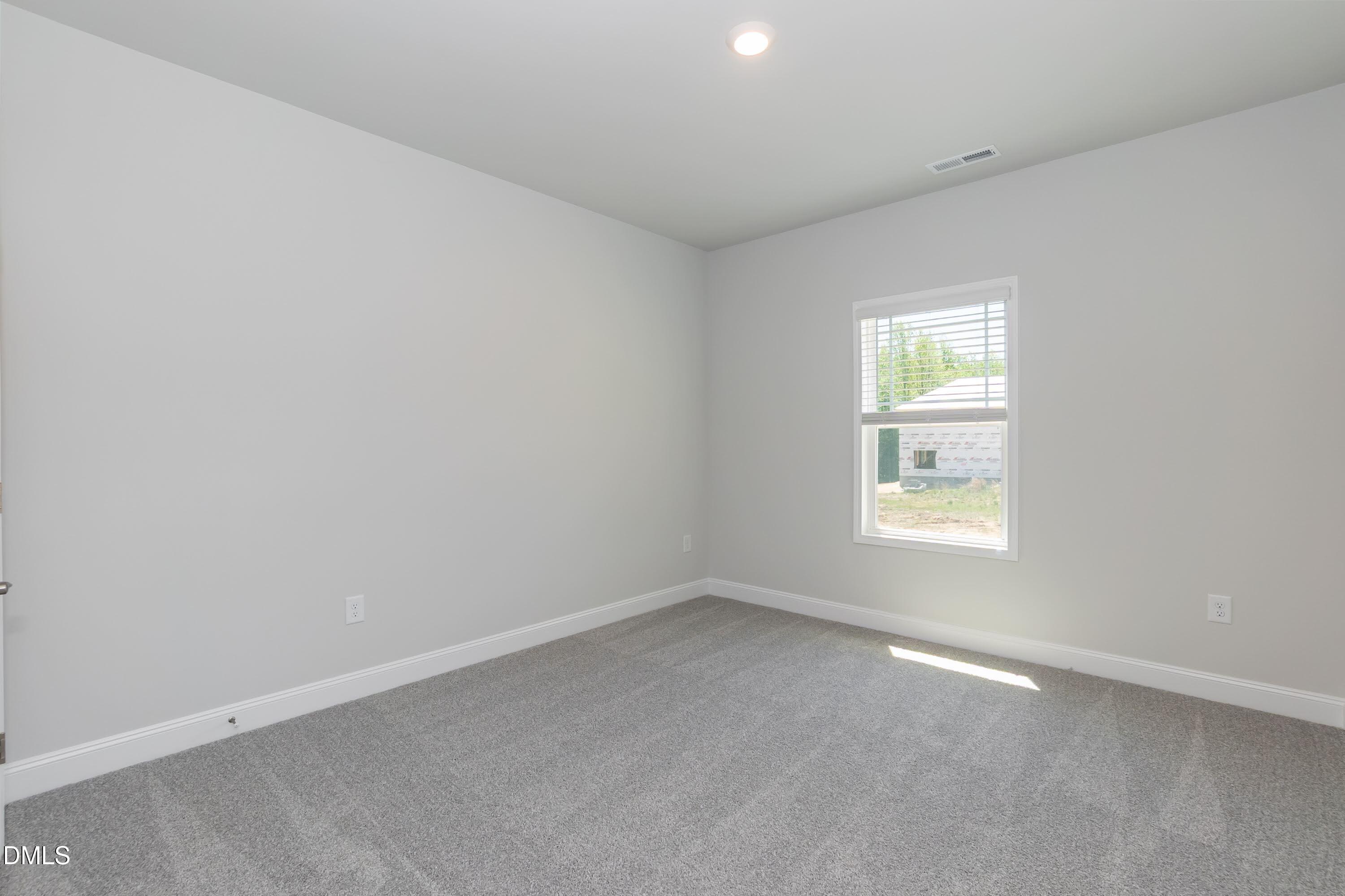 1 Galway Road Lillington, NC 27546 - Photo 23 of 30 an empty room with a window