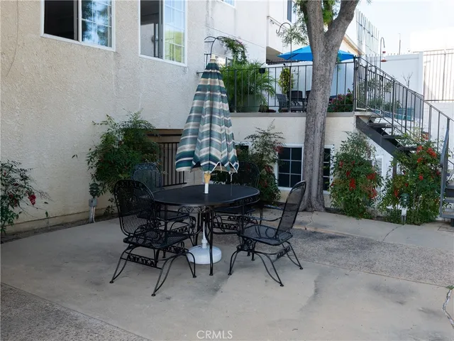 a bathroom with a toilet a sink and a mirror