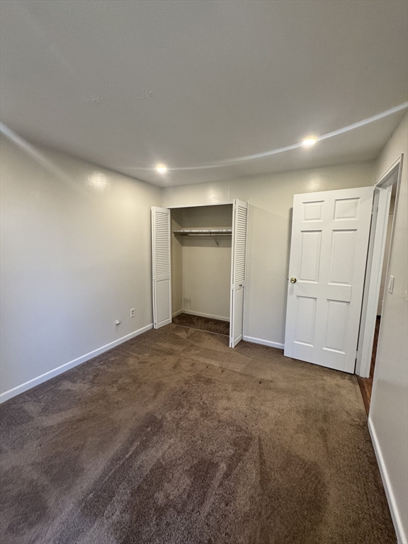 144 Kenrick Street, Unit 12 Boston, MA 02135 - Photo 7 of 11 a view of an empty room