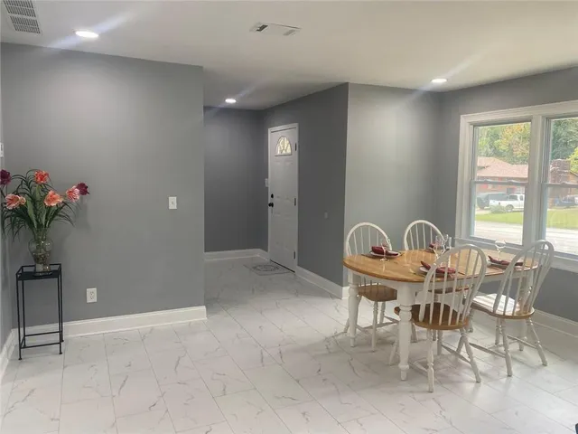 a bathroom with a toilet sink and bathtub
