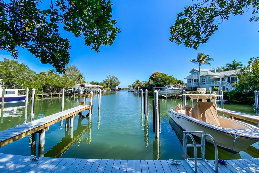 641 Boca Bay Drive Boca Grande, FL 33921 - Photo 55 of 74 a balcony with an ocean view
