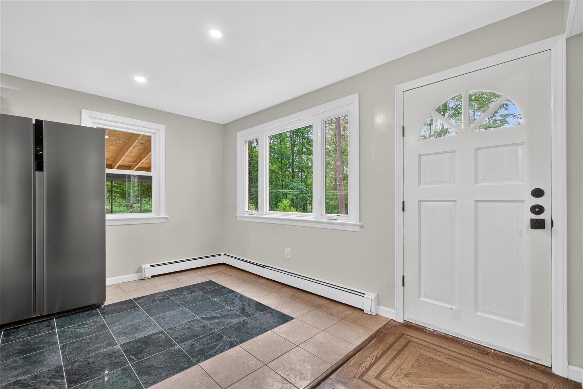 52 Luxton Lake Road Narrowsburg, NY 12764 - Photo 11 of 38 wooden floor in an empty room with a window