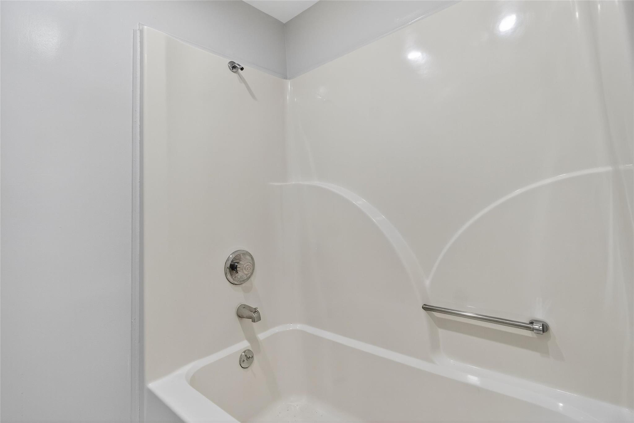 52 Luxton Lake Road Narrowsburg, NY 12764 - Photo 16 of 38 a bathroom with a tub