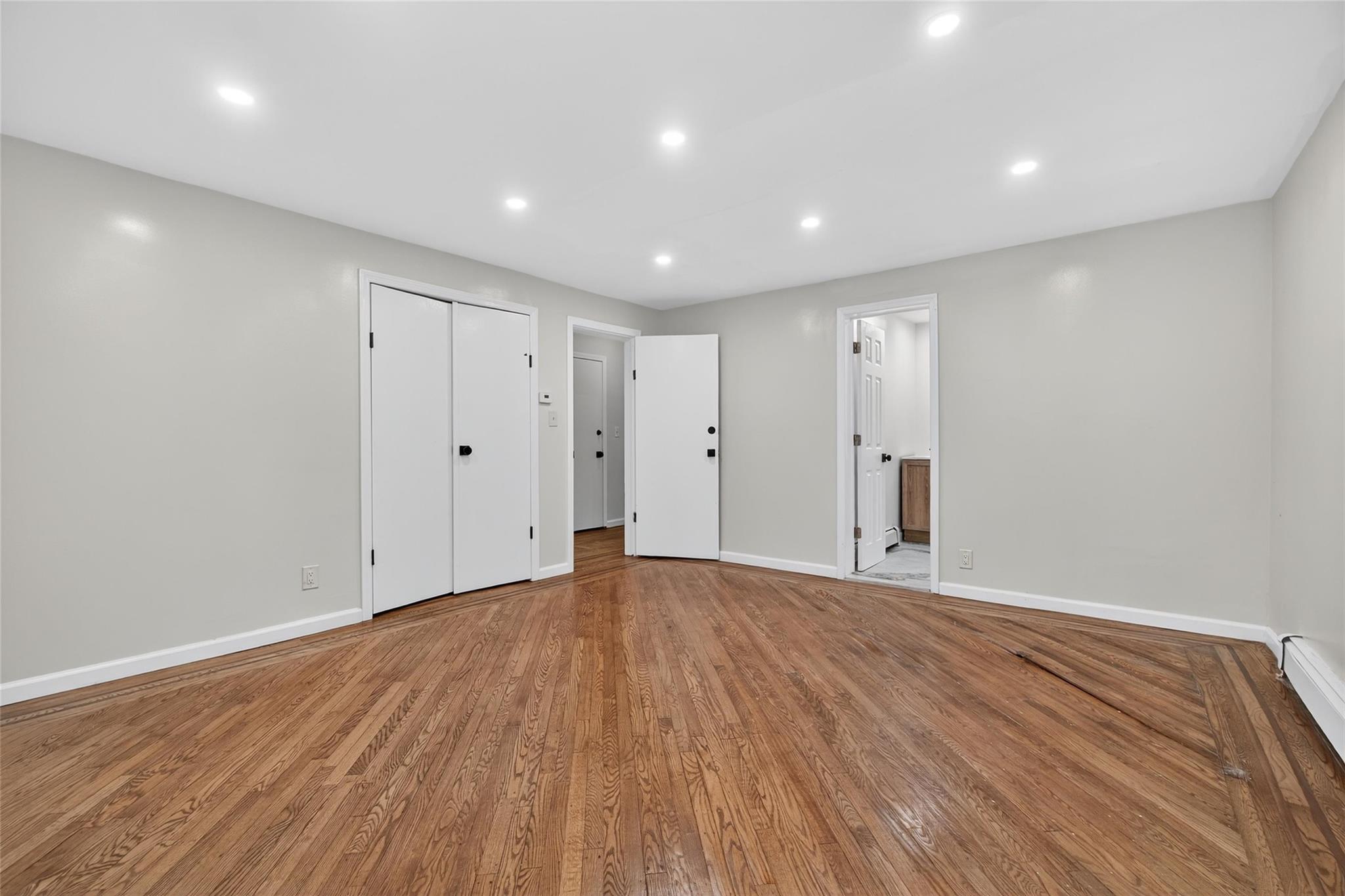 52 Luxton Lake Road Narrowsburg, NY 12764 - Photo 20 of 38 a view of an empty room with wooden floor