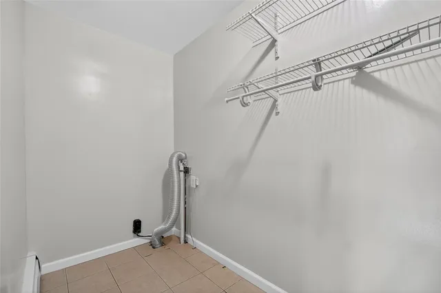 a view of a room with racks on the wall