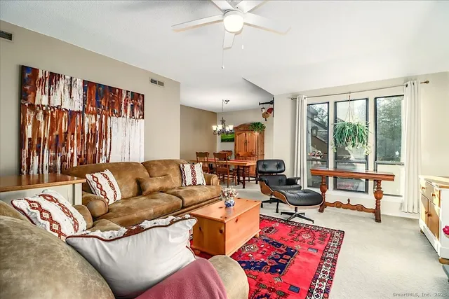 a sign that is sitting in a forest