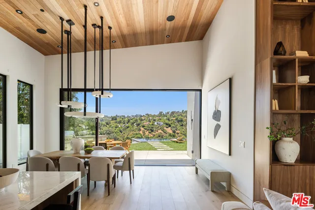 a view of swimming pool with furniture