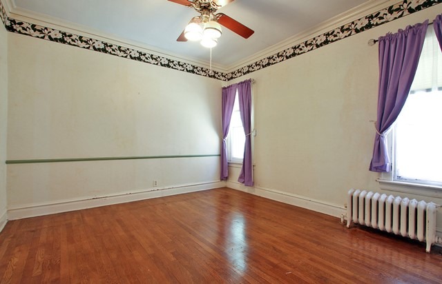 17 North Merrill Street Park Ridge, IL 60068 - Photo 8 of 10 a view of an empty room with wooden floor and a window