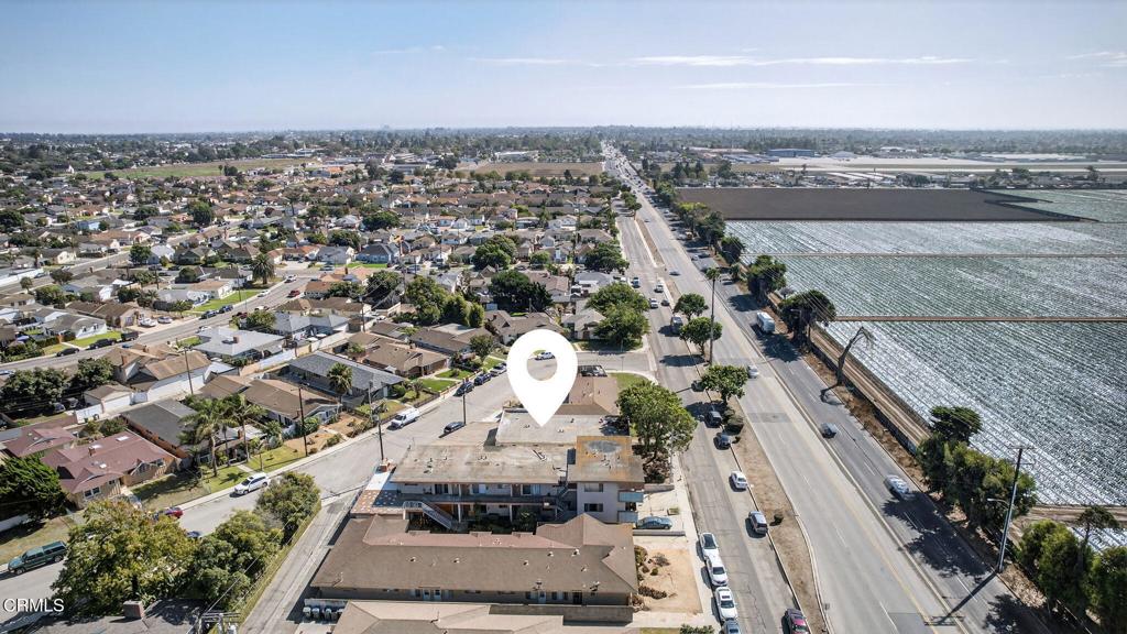 500 North Ventura Road Oxnard, CA 93030 - Photo 7 of 8 an aerial view of a residential apartment building with a yard
