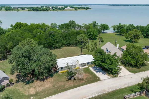 $513,000 | 104 Cove Drive, Shady Shores, TX 76208