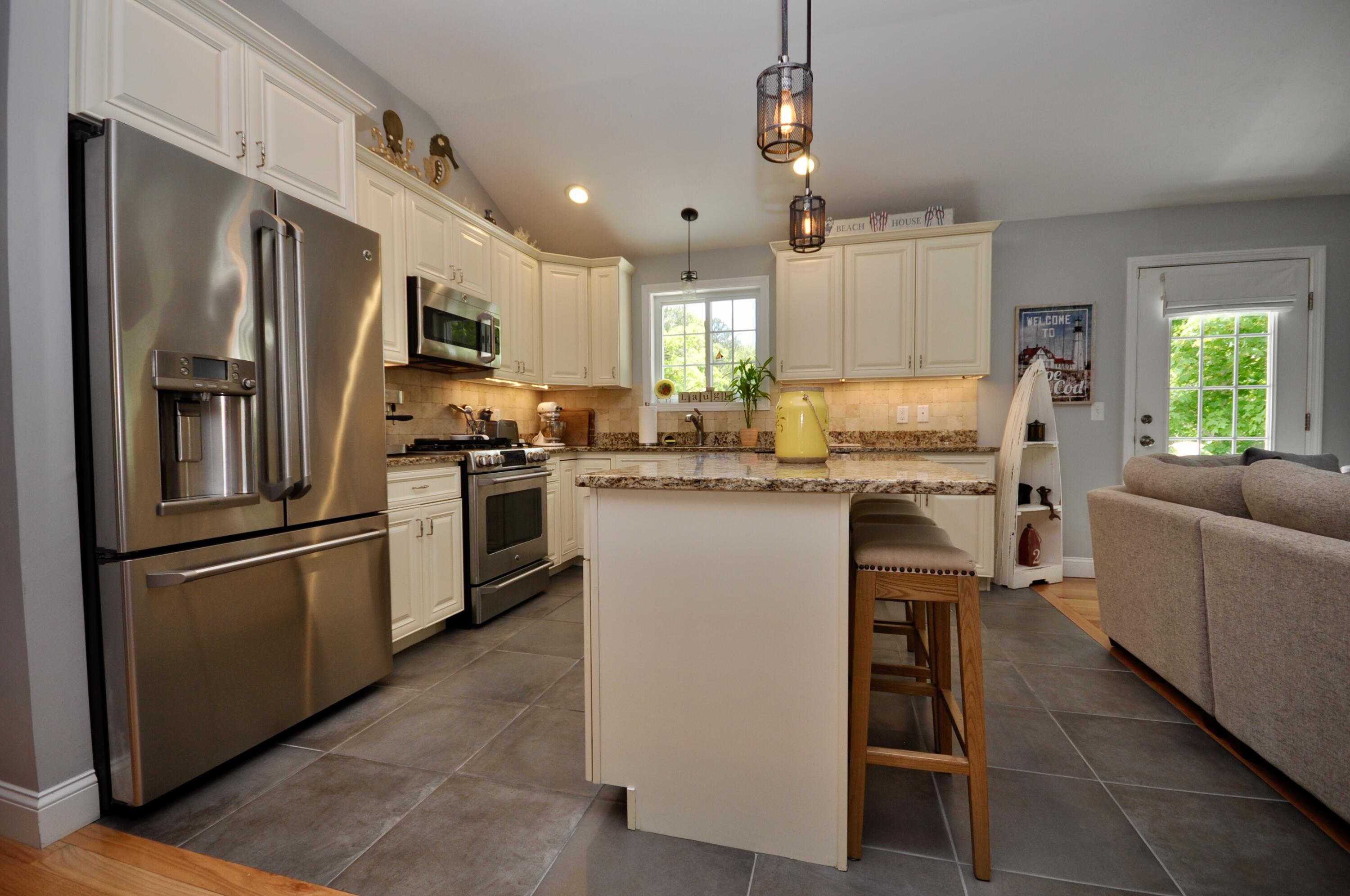 5 Bournedale Road Buzzards Bay, MA 02532 - Photo 11 of 39 a kitchen with refrigerator cabinets and furniture
