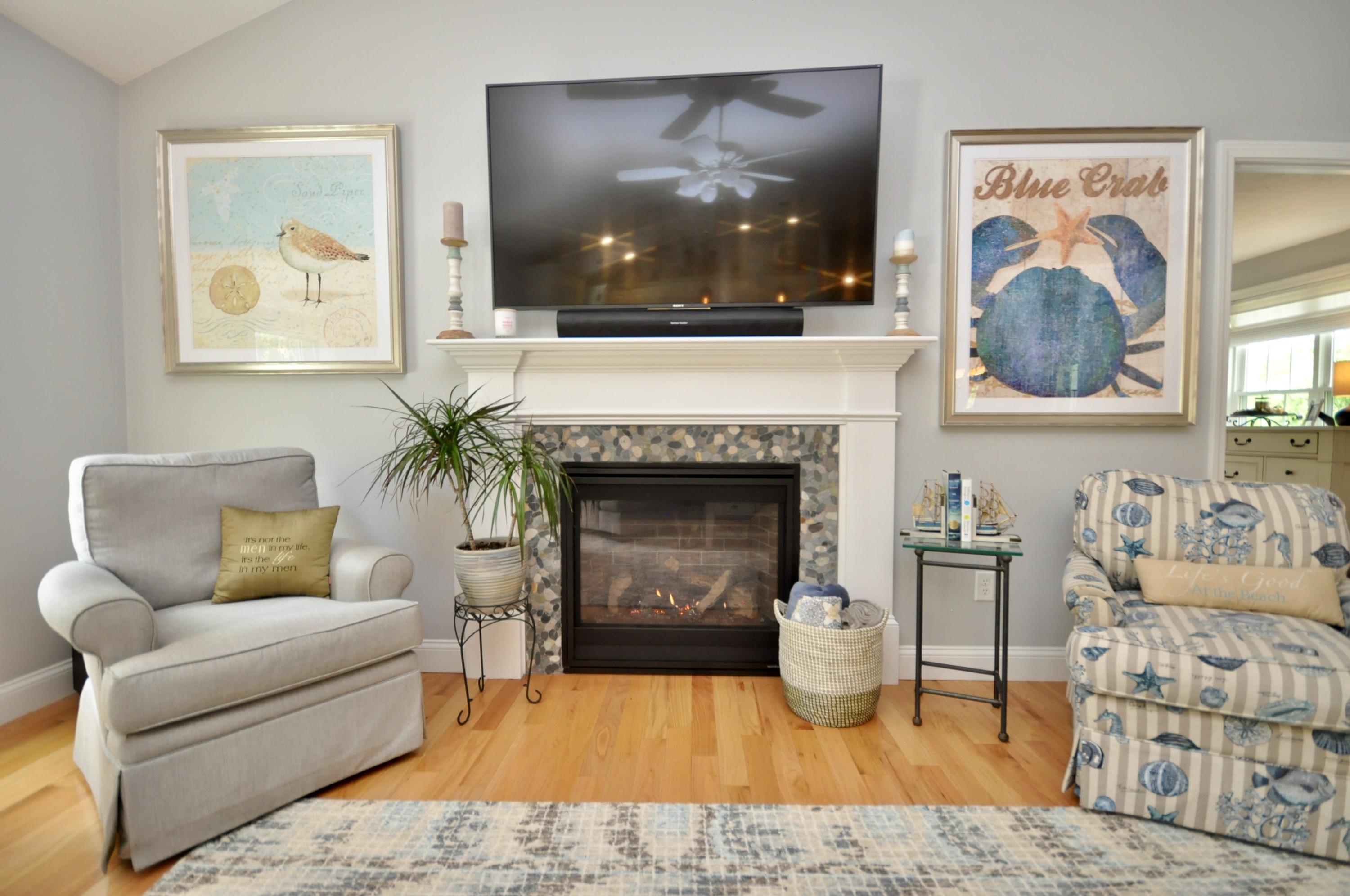 5 Bournedale Road Buzzards Bay, MA 02532 - Photo 15 of 39 a living room with furniture and a fireplace