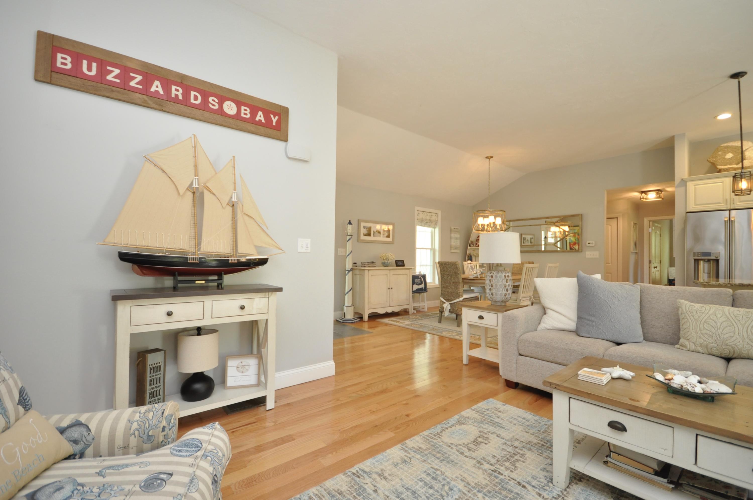 5 Bournedale Road Buzzards Bay, MA 02532 - Photo 16 of 39 a living room with furniture and a fireplace