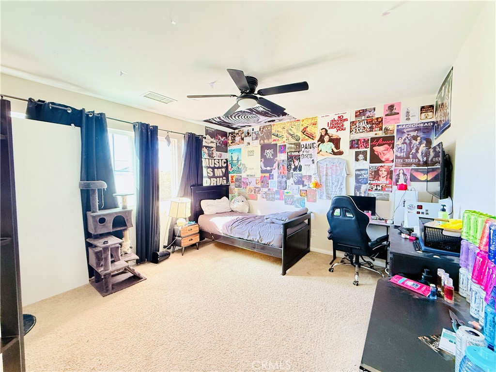 1652 Apollo Way Beaumont, CA 92223 - Photo 13 of 25 a bedroom