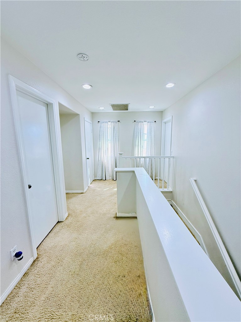 1652 Apollo Way Beaumont, CA 92223 - Photo 17 of 25 a view of entryway with kitchen