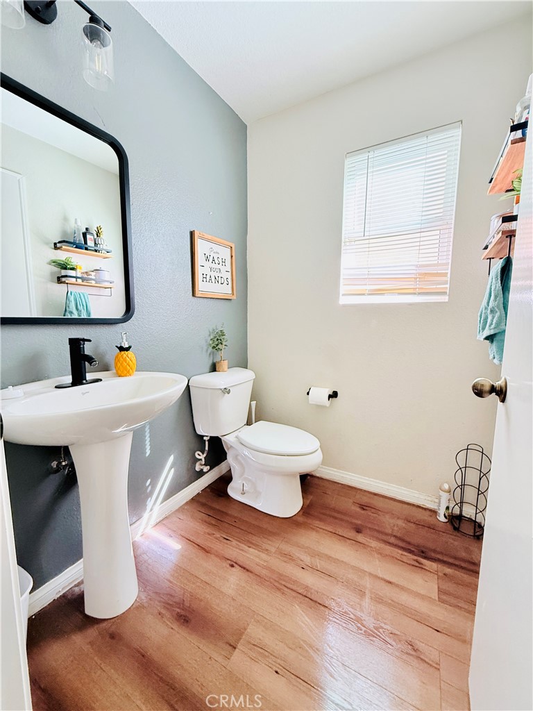 1652 Apollo Way Beaumont, CA 92223 - Photo 21 of 25 a living room with furniture and a table