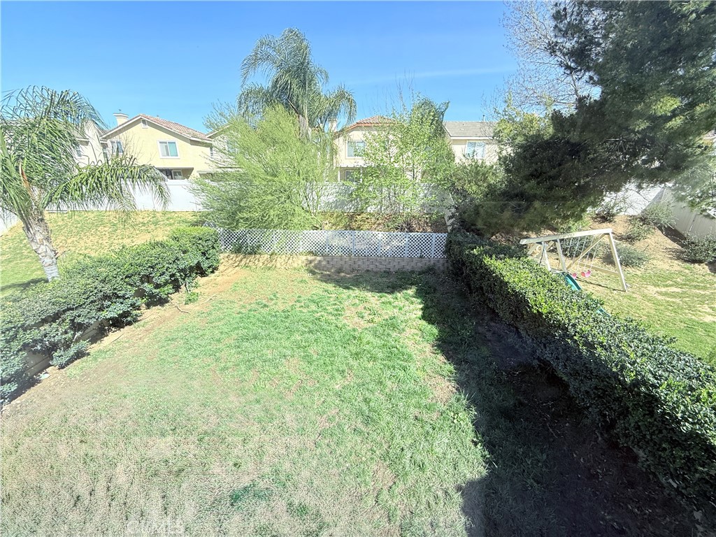 1652 Apollo Way Beaumont, CA 92223 - Photo 24 of 25 a view of a back yard of the house