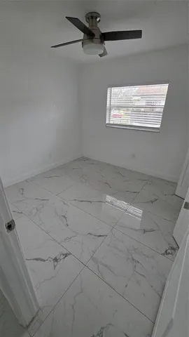 a view of a window in an empty room