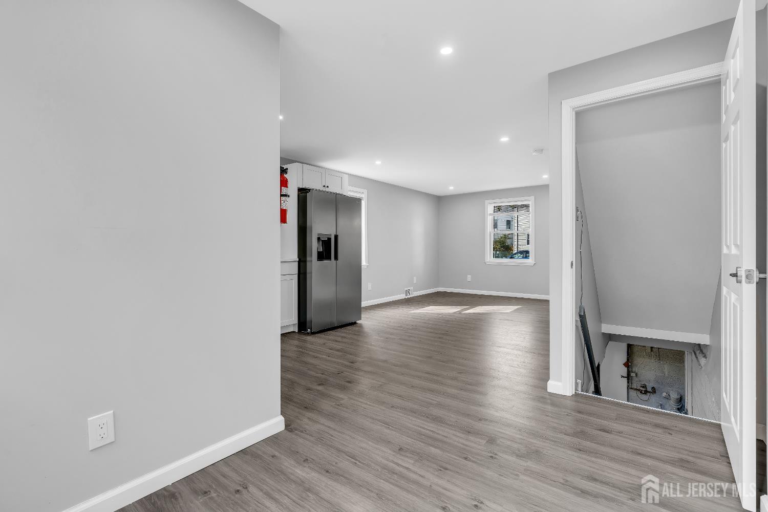 52 MacArthur Drive Edison, NJ 08837 - Photo 18 of 37 a view of livingroom with hardwood