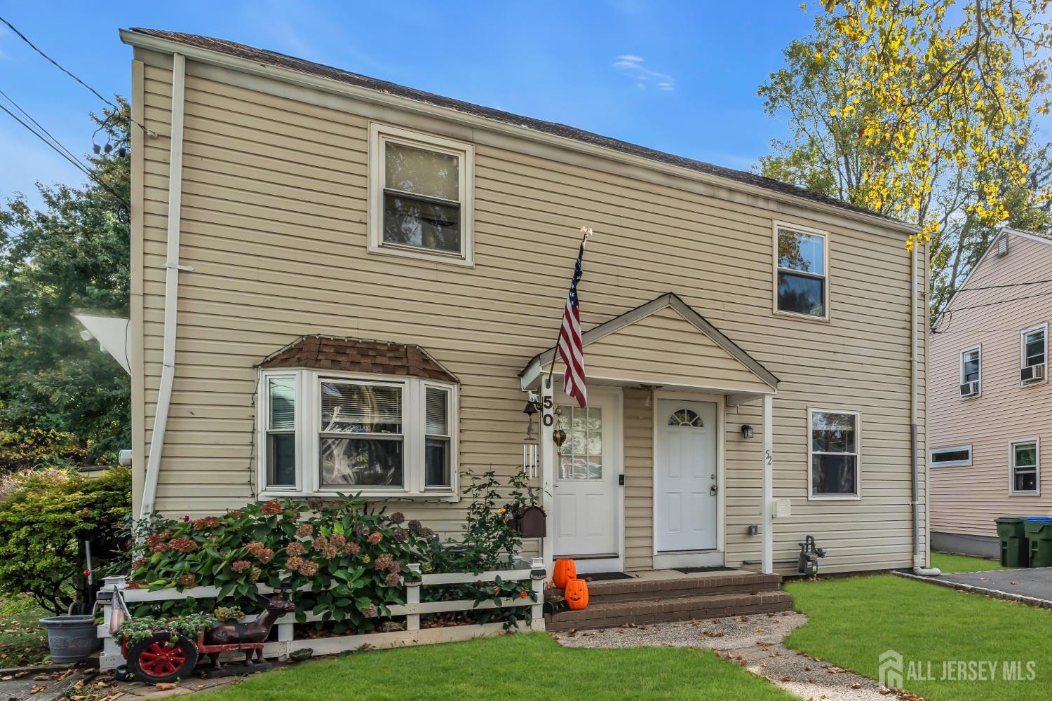 52 MacArthur Drive Edison, NJ 08837 - Photo 2 of 37 front view of a house with a yard