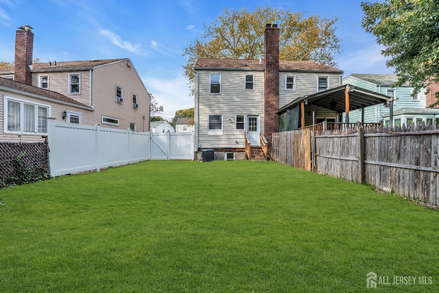 52 MacArthur Drive Edison, NJ 08837 - Photo 30 of 37 a front view of house with yard and green space