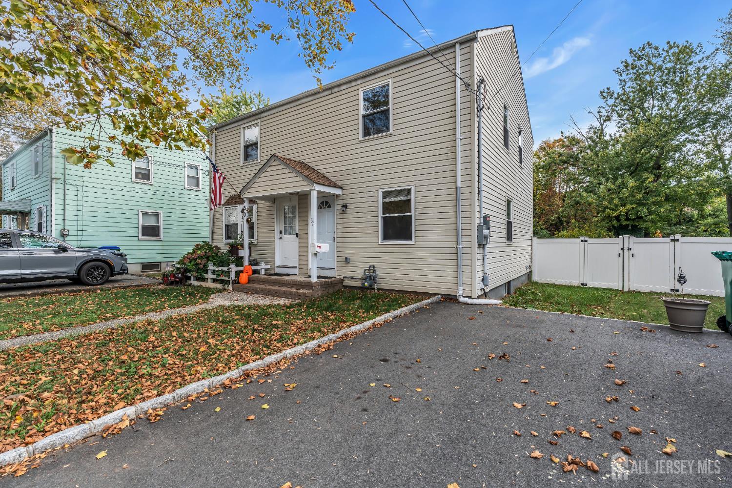 52 MacArthur Drive Edison, NJ 08837 - Photo 34 of 37 a front view of a house with garden