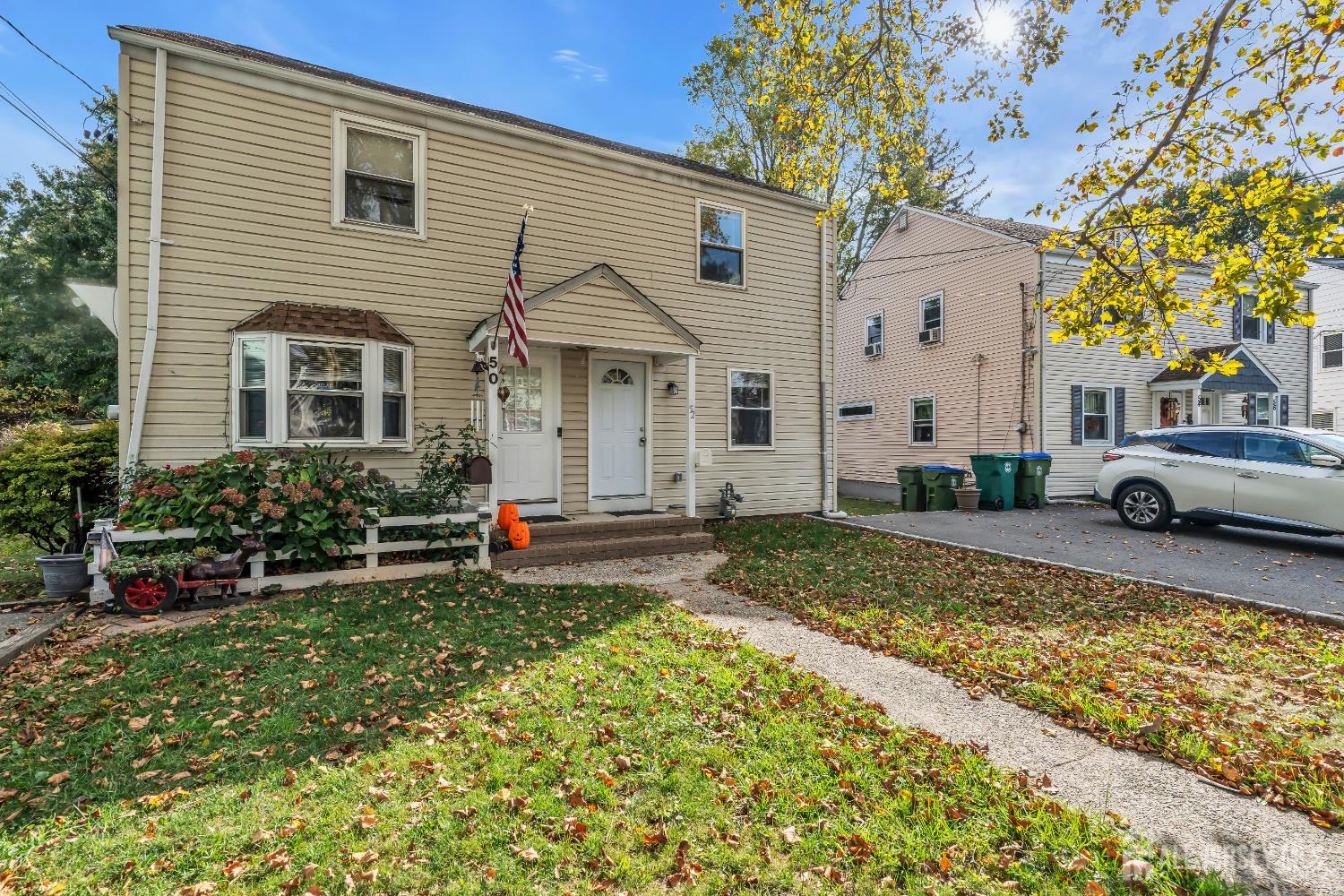 52 MacArthur Drive Edison, NJ 08837 - Photo 36 of 37 a front view of a house with a yard