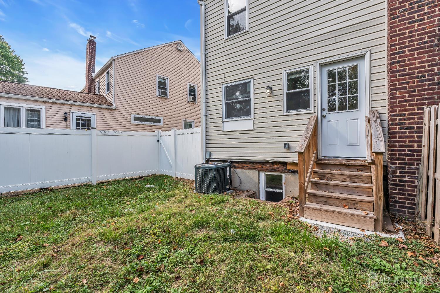 52 MacArthur Drive Edison, NJ 08837 - Photo 37 of 37 a view of a house with a yard