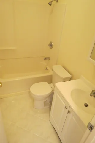 a view of a kitchen with wooden floor