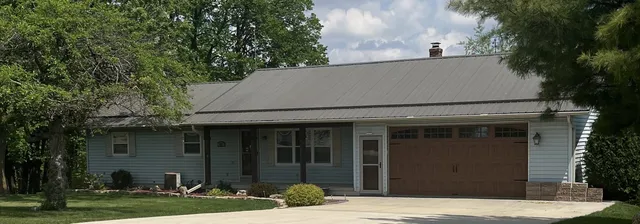 front view of house with a yard