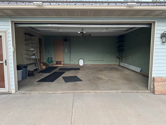 a view of backyard with a deck