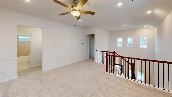 an entryway in a hall with a window