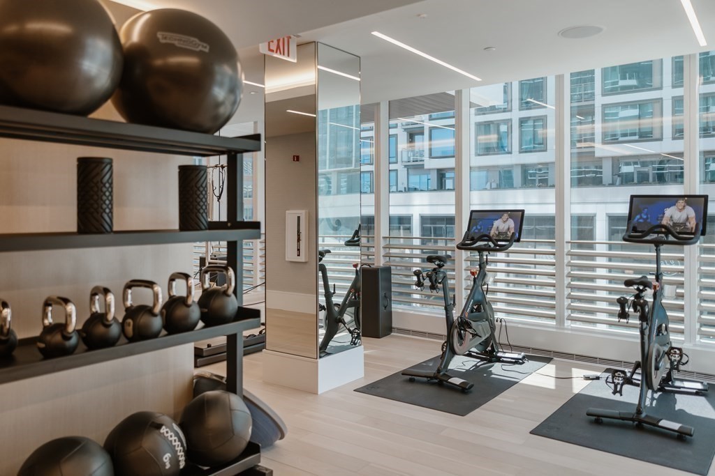 150 Seaport Boulevard, Unit B Boston, MA 02210 - Photo 25 of 27 a view of a room with gym equipment