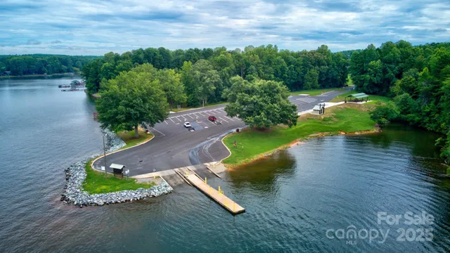 an aerial view of houses with yard
