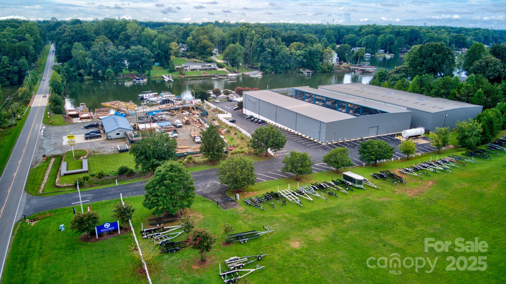 496 Kenway Loop Mooresville, NC 28117 - Photo 31 of 32 a view of a house with a garden