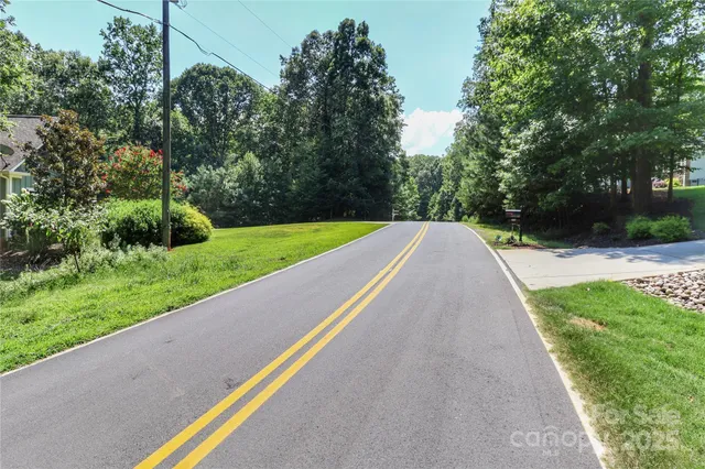 a view of swimming pool with a yard