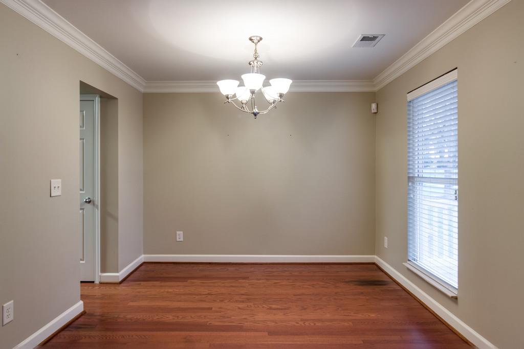 2005 Field Farm Court Spring Hill, TN 37174 - Photo 6 of 30 a view of an empty room with wooden floor and a window