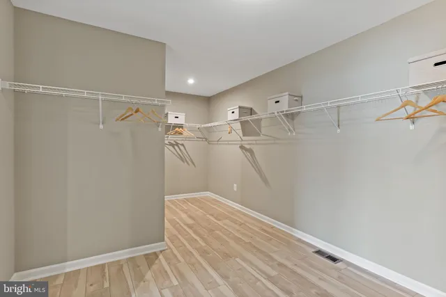 a view of a room with racks on the wall