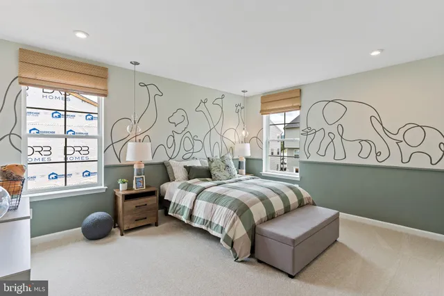 a bedroom with bed and a window